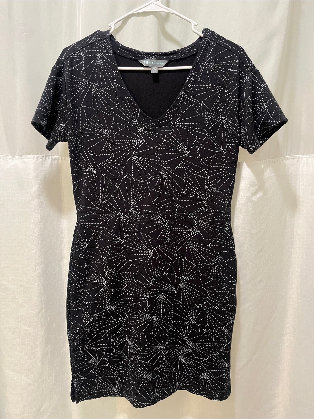 Title nine Black Dress with White Geometric Design